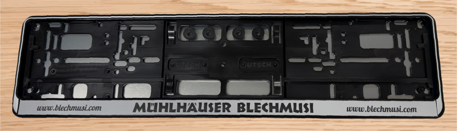 Kfz.-Kennzeichenhalter "Blechmusi" (Artikel 202510002)